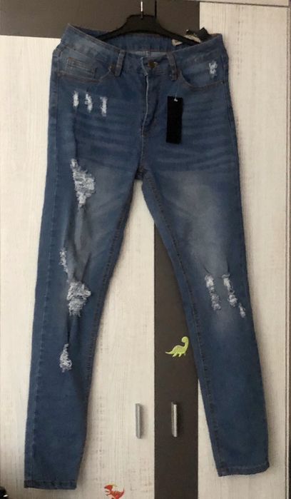 Modne Spodnie jeans dziury r.9 fashionova
