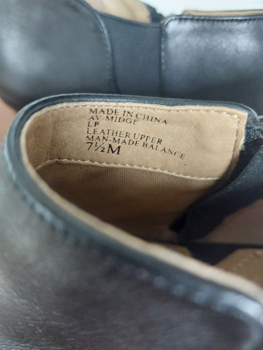 Skórzane botki na koturnie