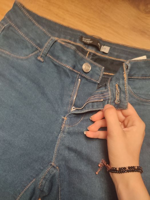 granatowe spodnie z sinsay