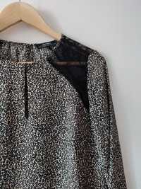 Blusa com padrão leopardo nova