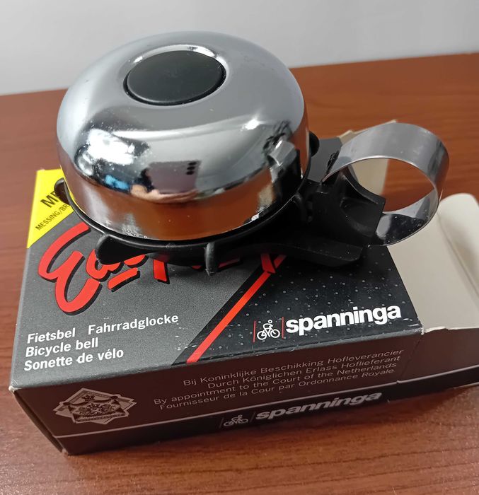 Dzwonek rowerowy firmy Spanninga / Made in Holland / metalowy,srebrny.