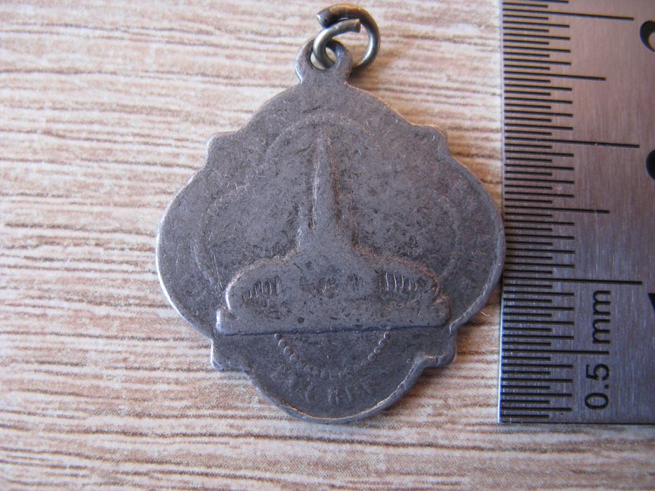 Stary medalik religijny