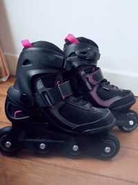 Patins em linha (pretos e cor-de-rosa)