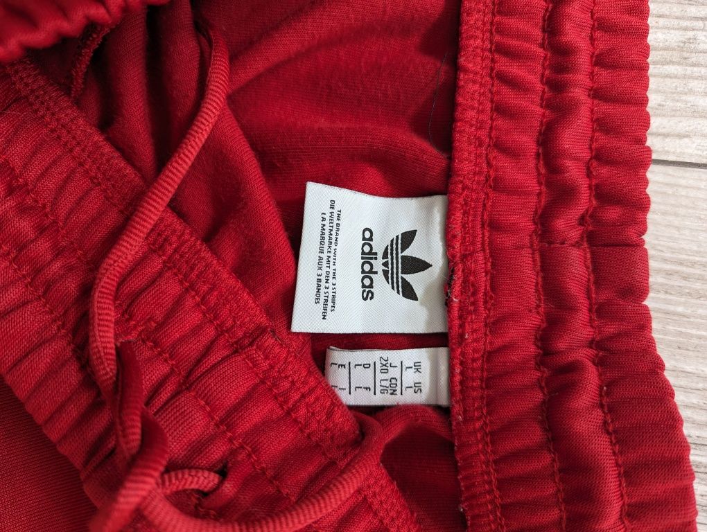 Спортивні штани Adidas червоного кольору