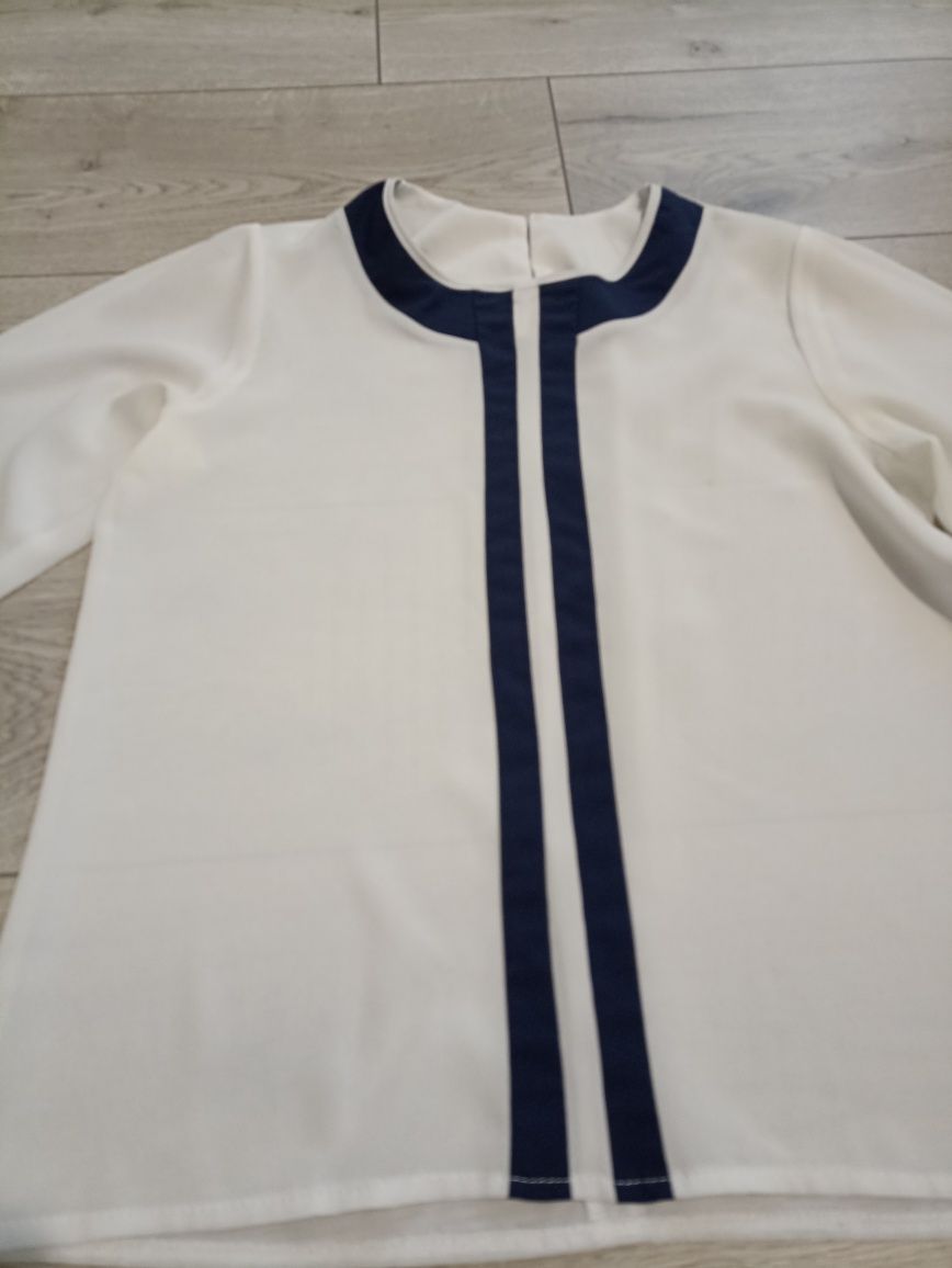 Біла блуза жіноча