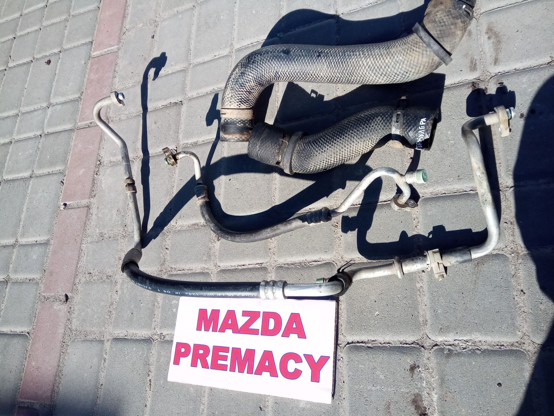 Бачок расширительный омывательный шланг радиатора Mazda Premacy 2.0TD.