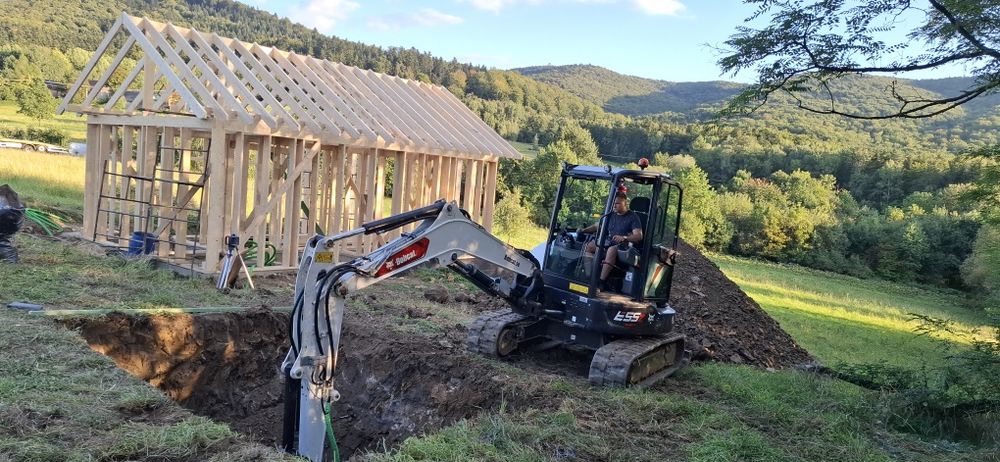 Roboty ziemne transport Wykopy Niwelacja pomoc drogowa odśnieżanie