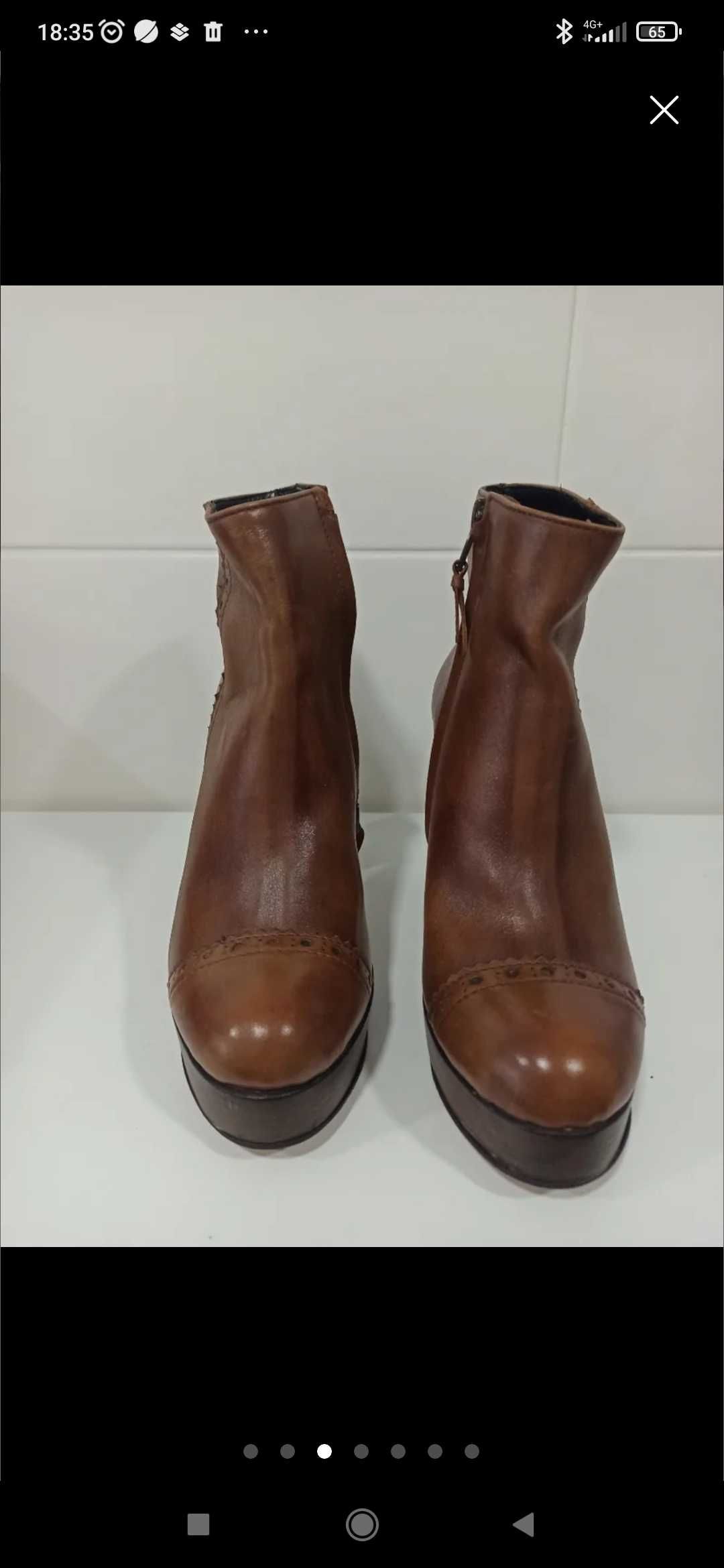 Botas novas em pele