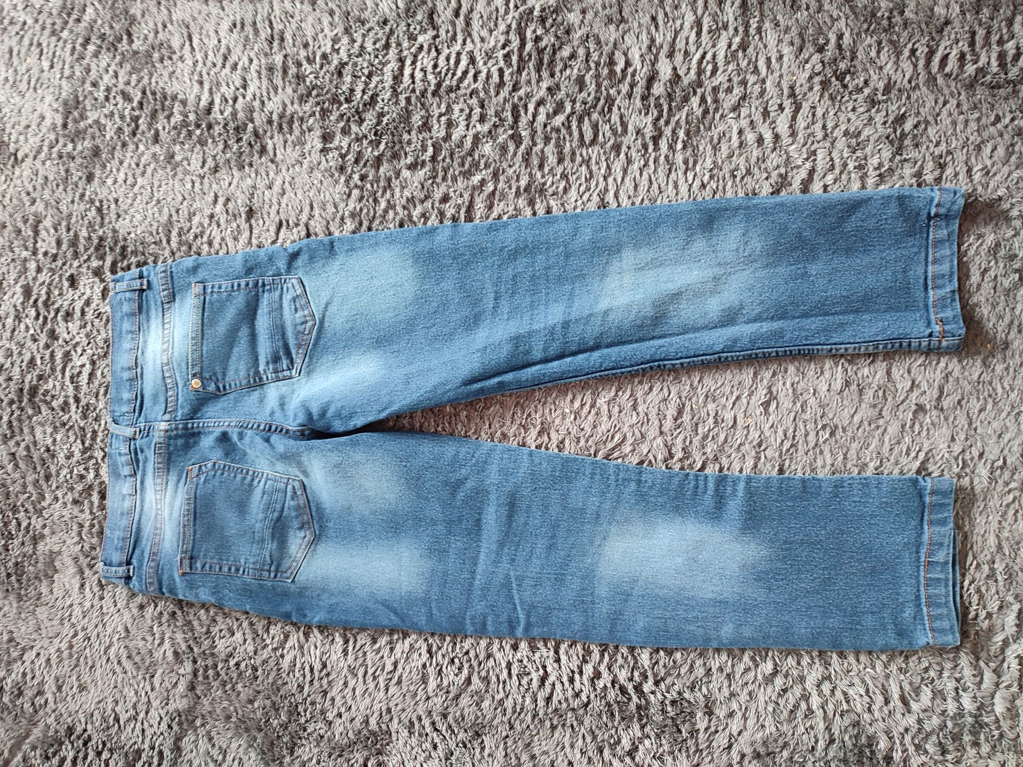Spodnie jeansy chłopięce w rozmiarze 140