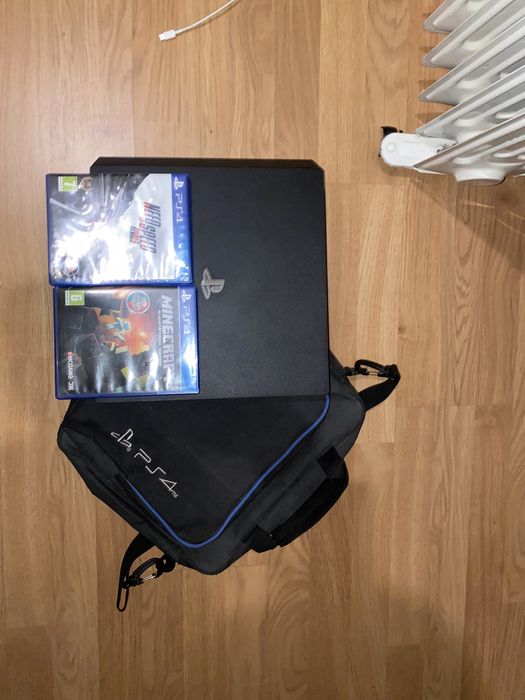 Playstation 4 Pro + Mala Playstation e Jogos