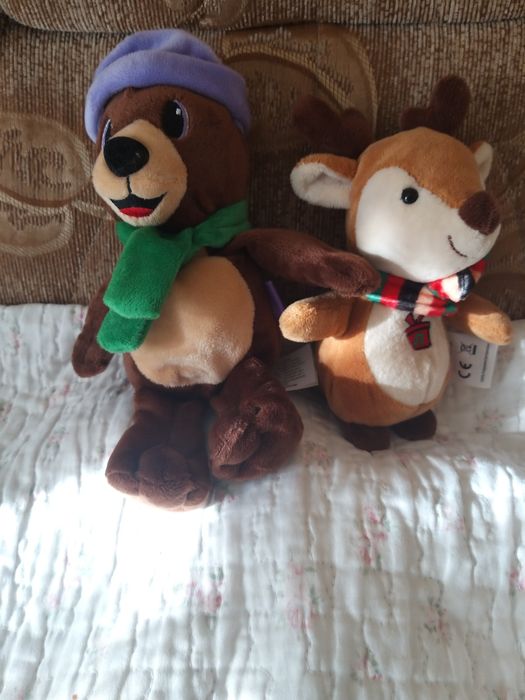 М'які іграшки  олень співає