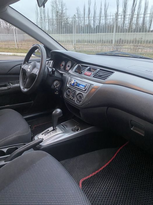 Mitsubishi Lancer 9 1.6 газ4 автомат