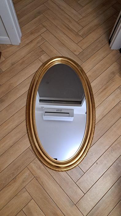 Duże złote lustro