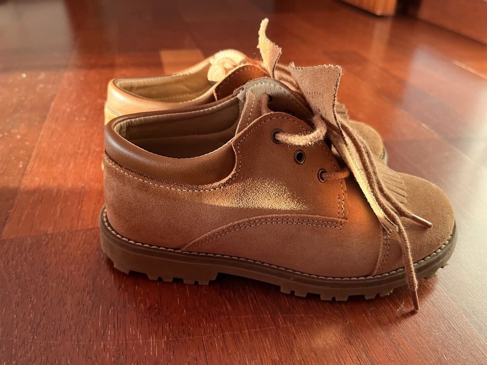 Sapatos com pouco uso