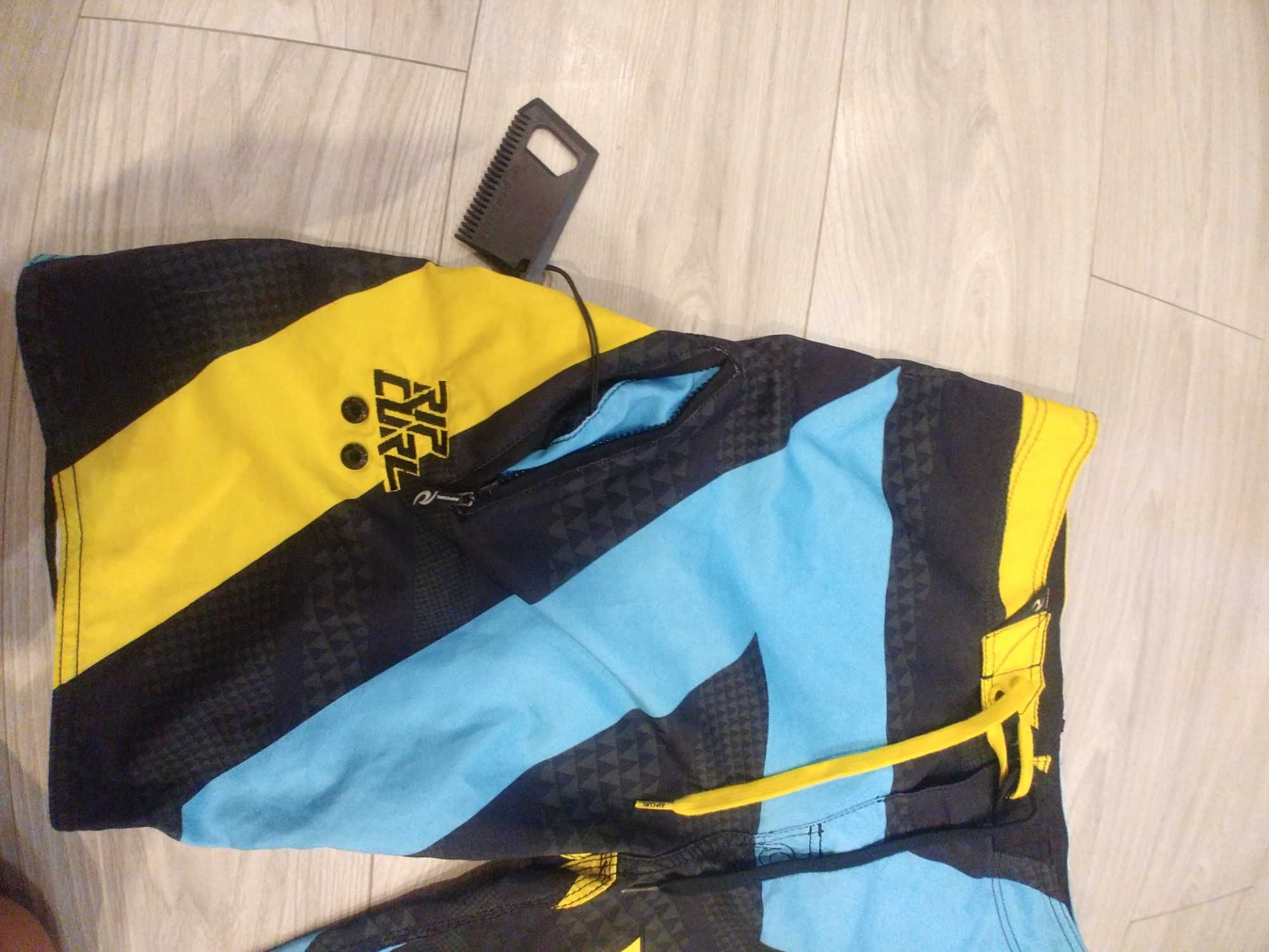 Spodenki surfing deska surfingowa Rip Curl 32 M L grzebien surferski