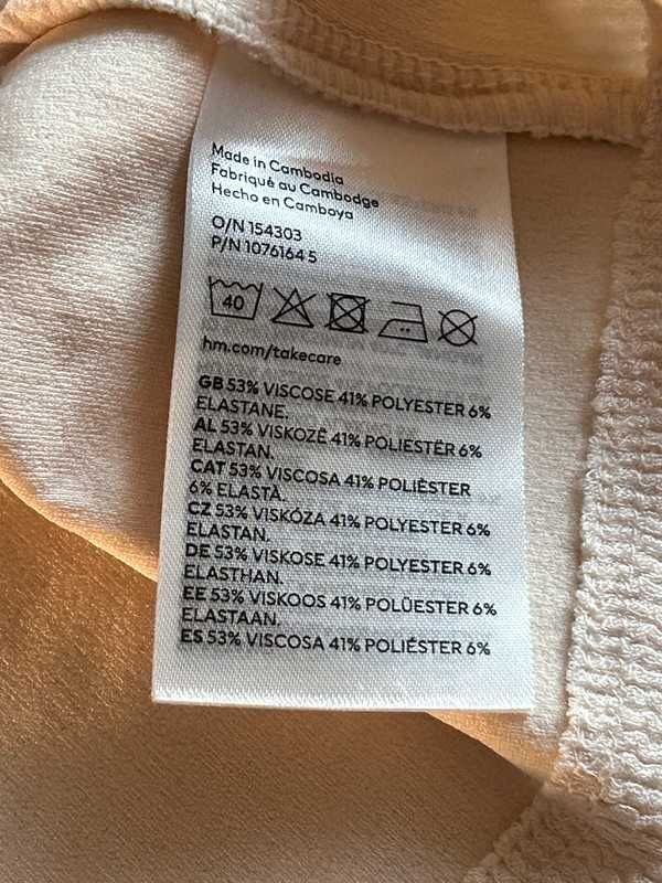 Top crop H&M bluzka mocno wycięta L kokarda beżowa kremowa