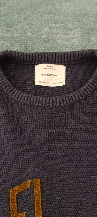 Camisola 100% algodão , bolsos laterais