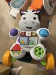 Fisher Price zebra jeździk pchacz