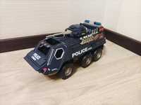 Іграшковий поліцейський бронетранспортер