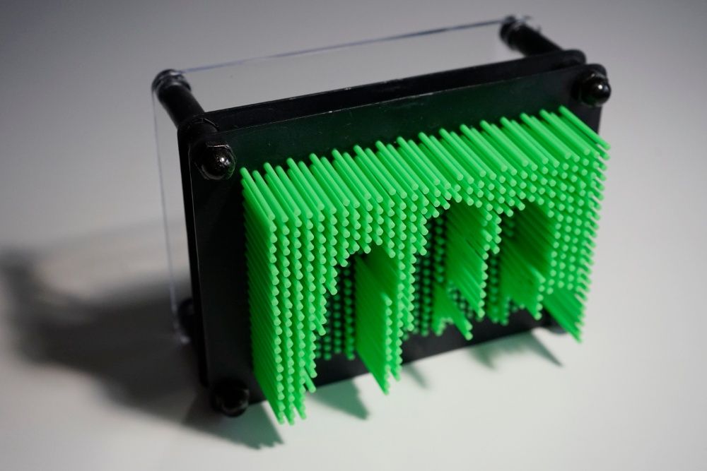 Escultura de pins/pregos para impressão 3D momentânea