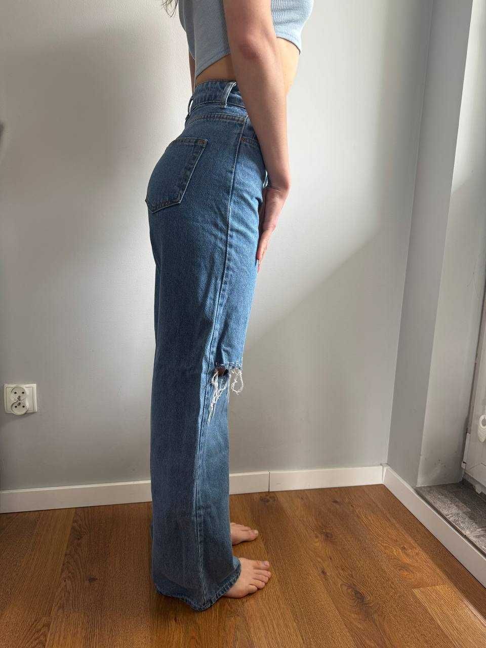 Damskie jeansy z dziurami