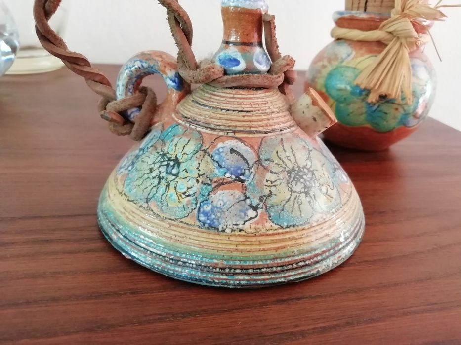 Lamparina e pote em barro