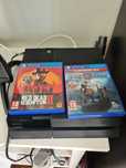 ps4 500 gb + 2 games (NO JOYSTICK)