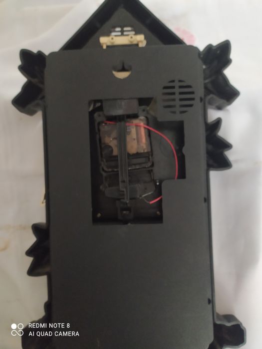 Раритетные настенные часы с маятником.