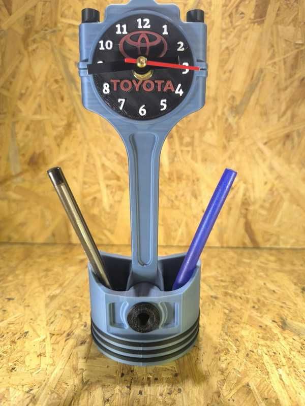 Relógio de mesa decorativo Toyota – formato pistão