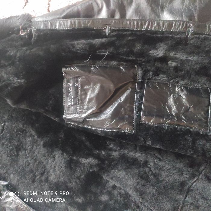 Чорне стильне пальто з натуральної шкіри