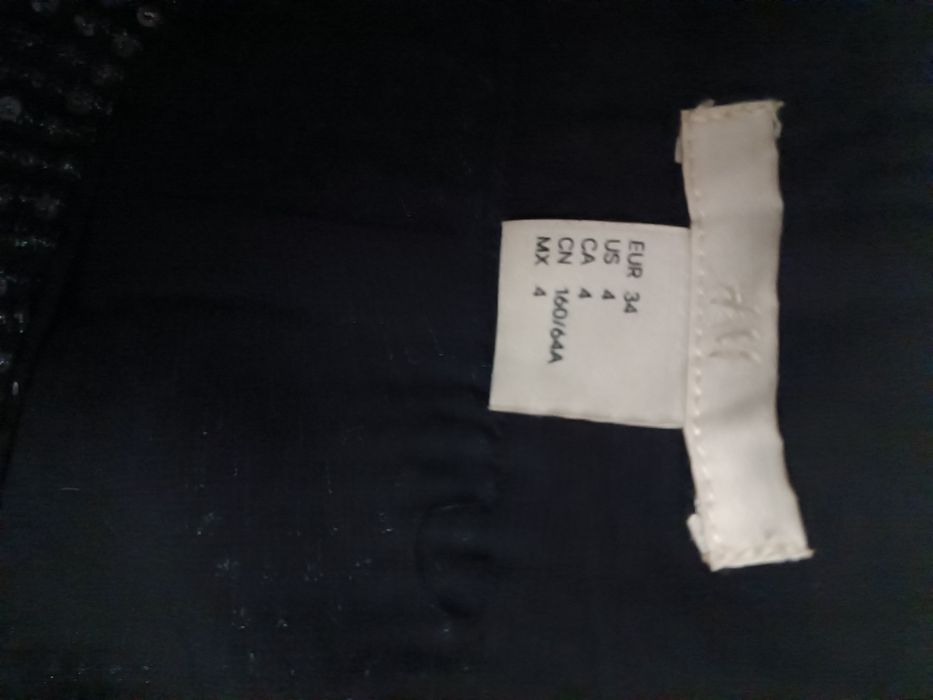 Брюки на девочку H&M с пайетками р.34