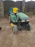 John deere 455 z kosiskiem i koszem