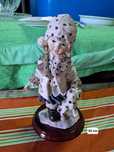 Estatueta nenina e cão