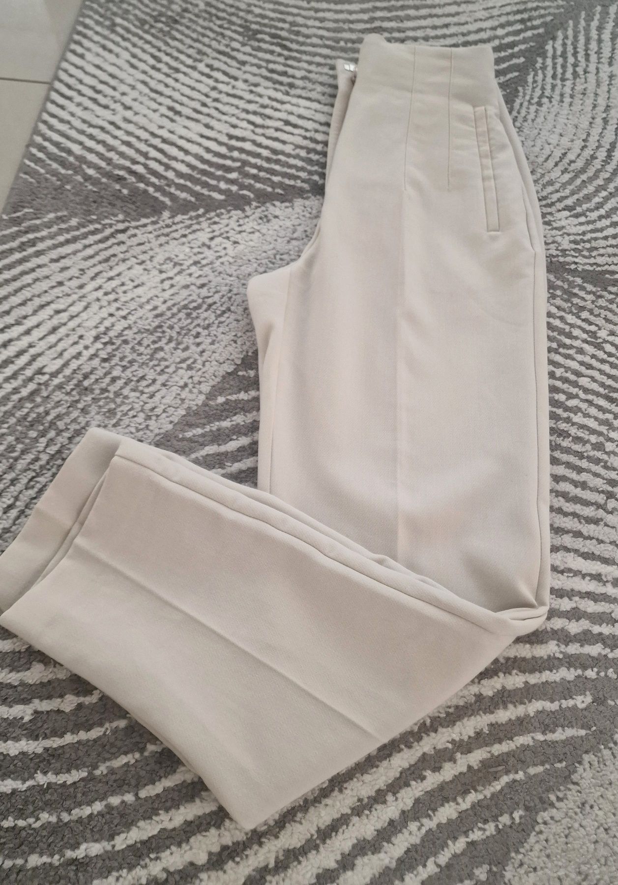 Spodnie ecru"Zara".