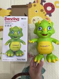 Игрушка танцующий динозавр
