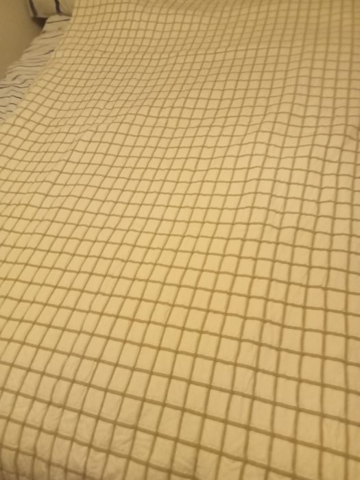 Cabeceira de cama e cortinados