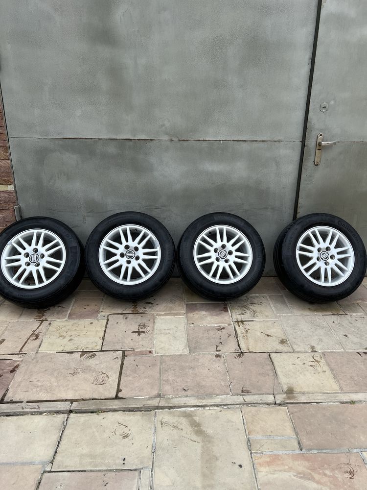 Диски Volvo  Ford шини 195/65 r-15