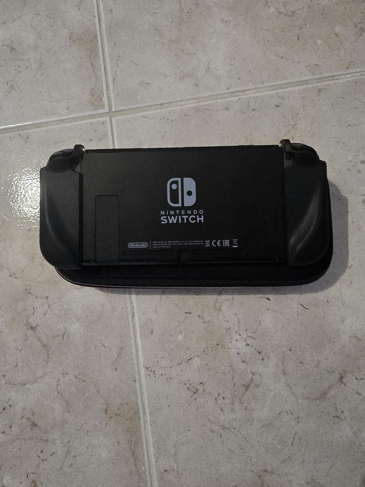 Nintendo Switch V2 cinza com bolsa