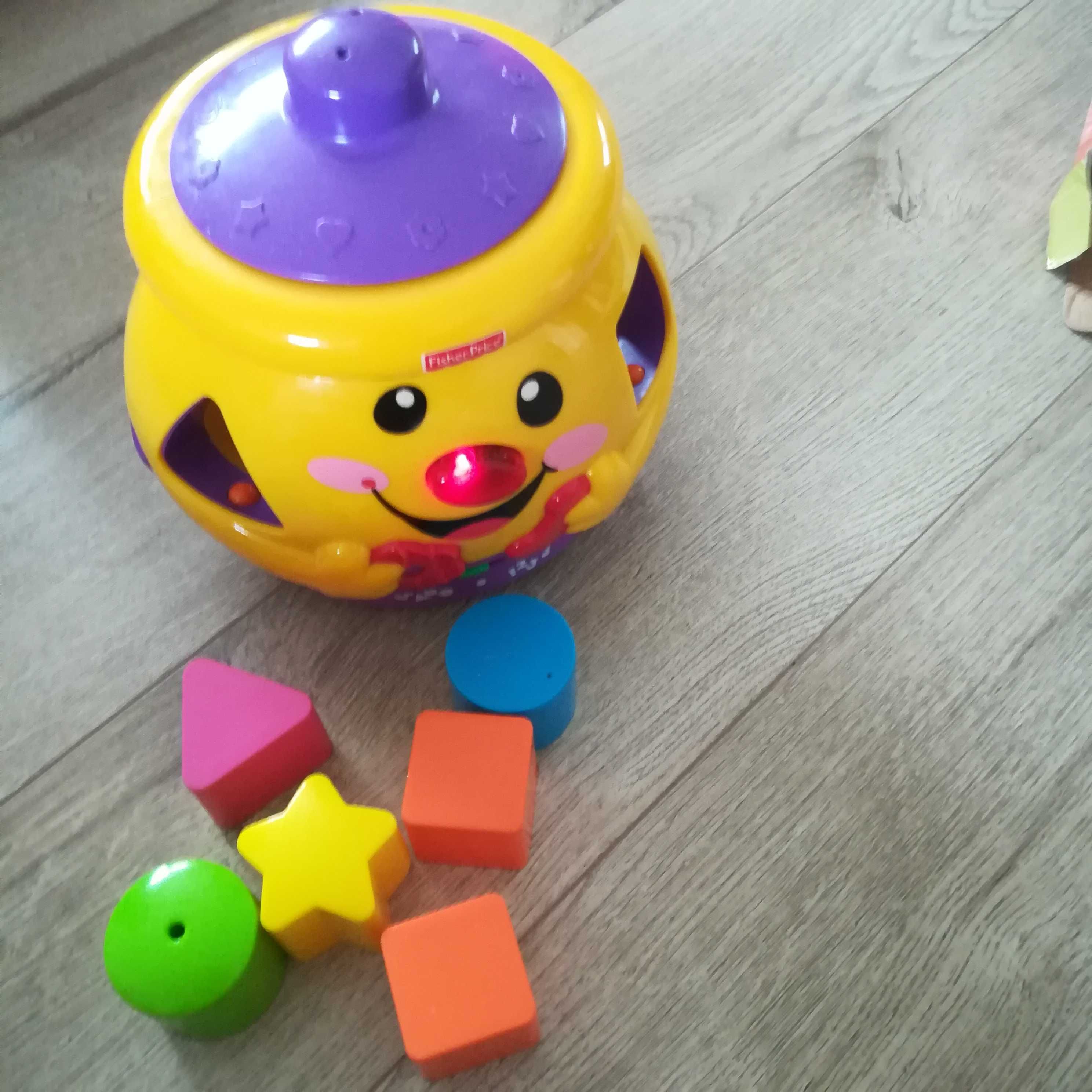 Garnuszek na klocuszek Fisher price