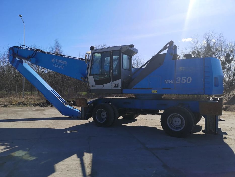 Fuchs Mhl 350  Nowy silnik fuchs koparka przeladunkowa liebherr wynajm