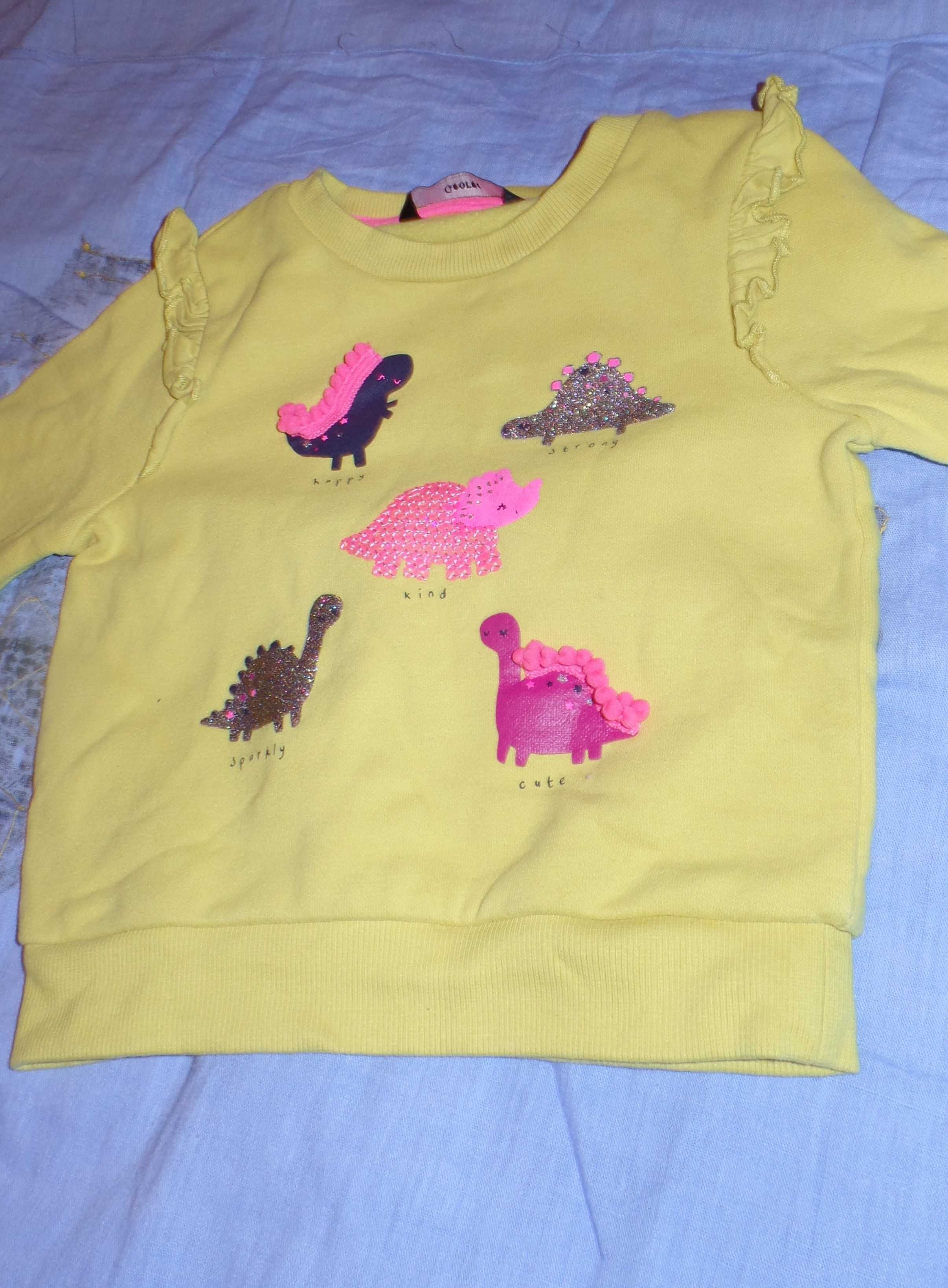 Żółta bluza dla dziewczynki z kolorowymi dinozaurami