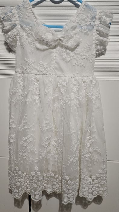 Biała koronka aniołek