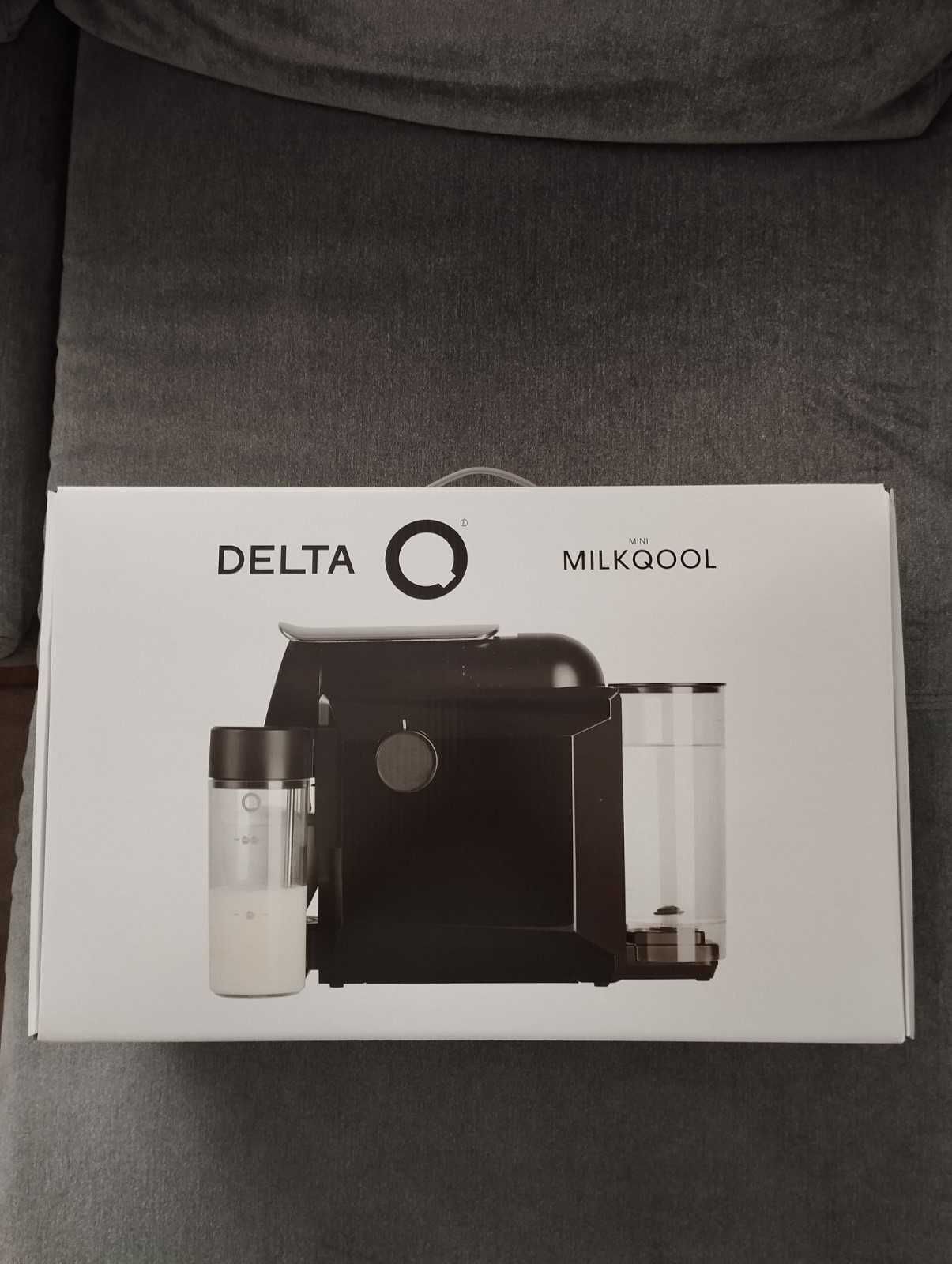 Капсульна кавоварка Nespresso Delta Q з капучинатором