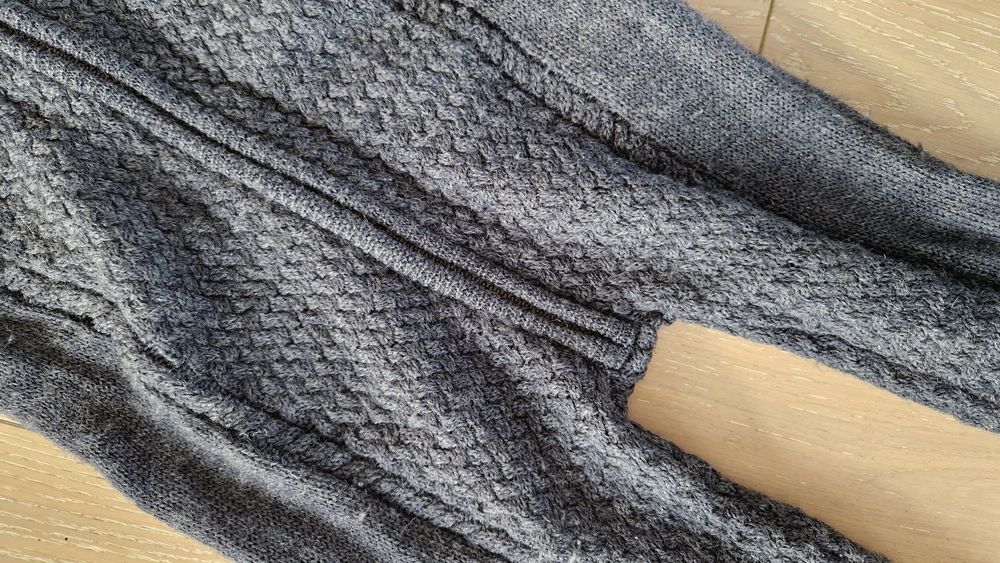 Kombinezon 100% merino gruby rozm. 110 Name it