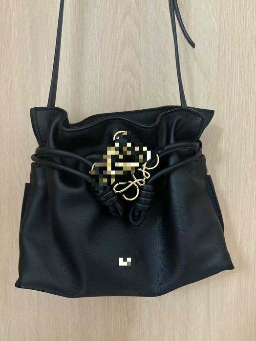 Bolsas de mão e tiracolo em couro