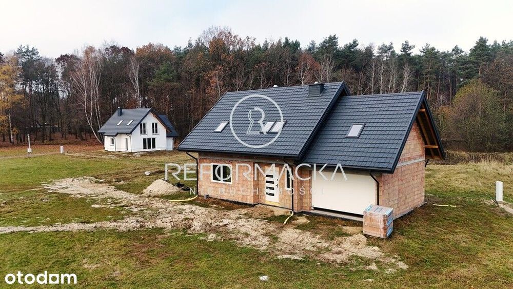 Dom pod lasem, stawy, garaż 2-stanowiskowy.