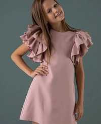 Сукня дитяча з воланами різних кольорів ошатна нарядна й повсякденна