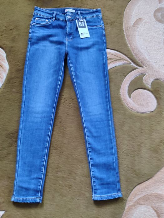 Жіночі джинси утеплені на флісі в новому стані