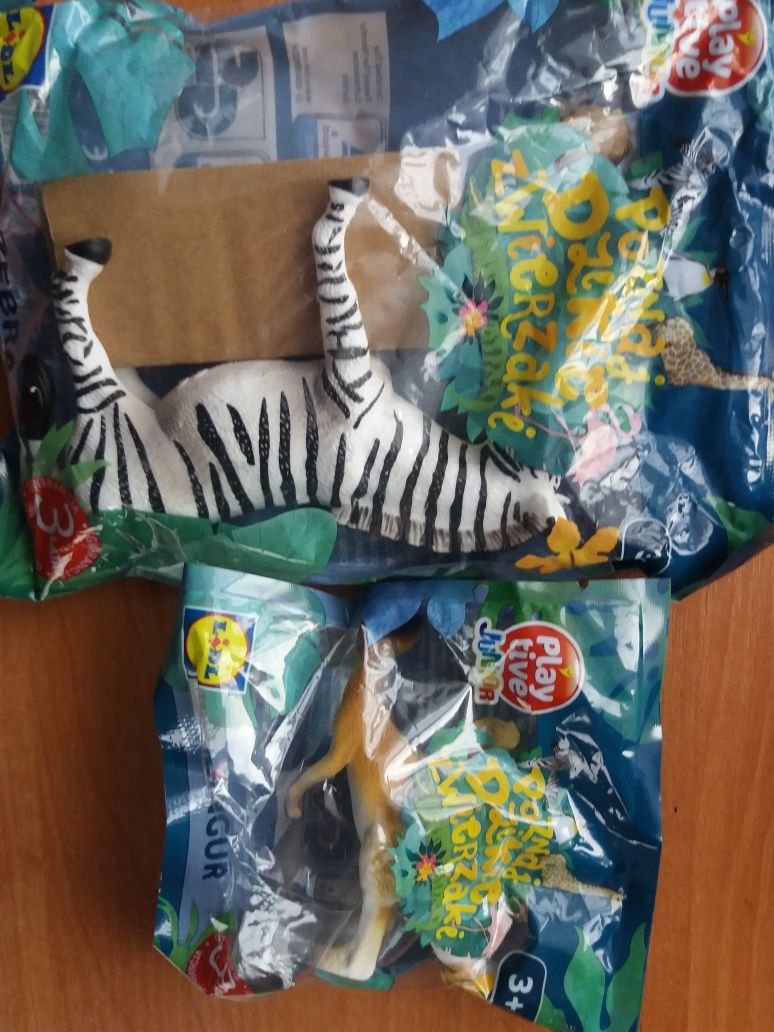Тварини свійські та зебра з кенгуру іграшки з пластмаси