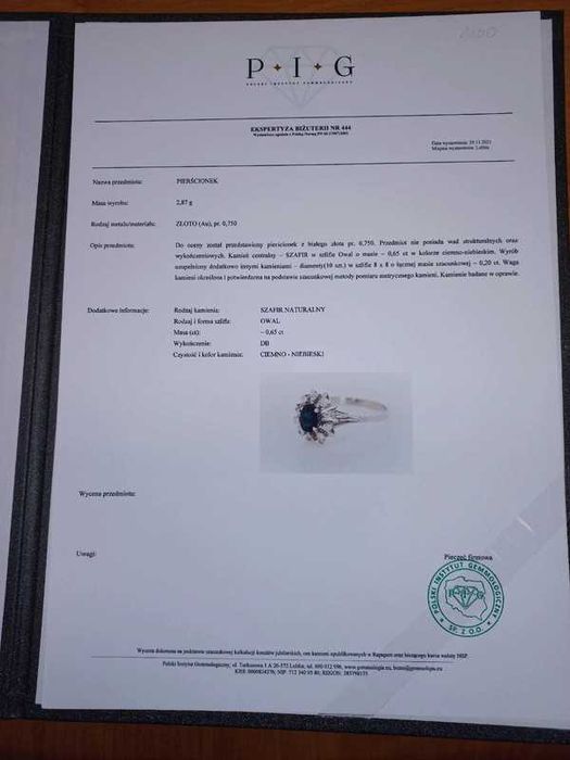 Pierścionek z białego złota Au750 z szafirem0,65ct i diamentami 0,20ct